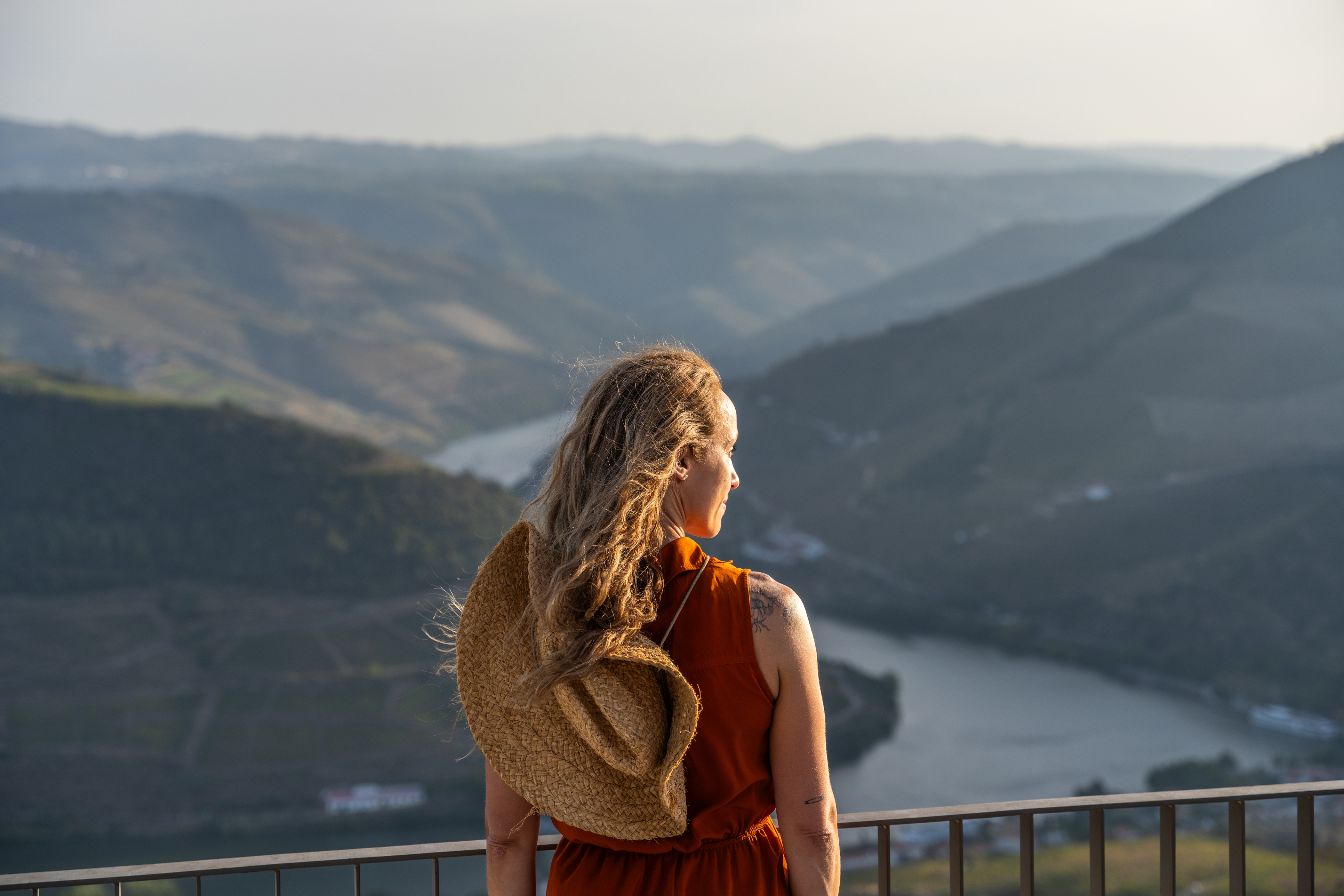Woman looking out over the Douro Valley, Portugal